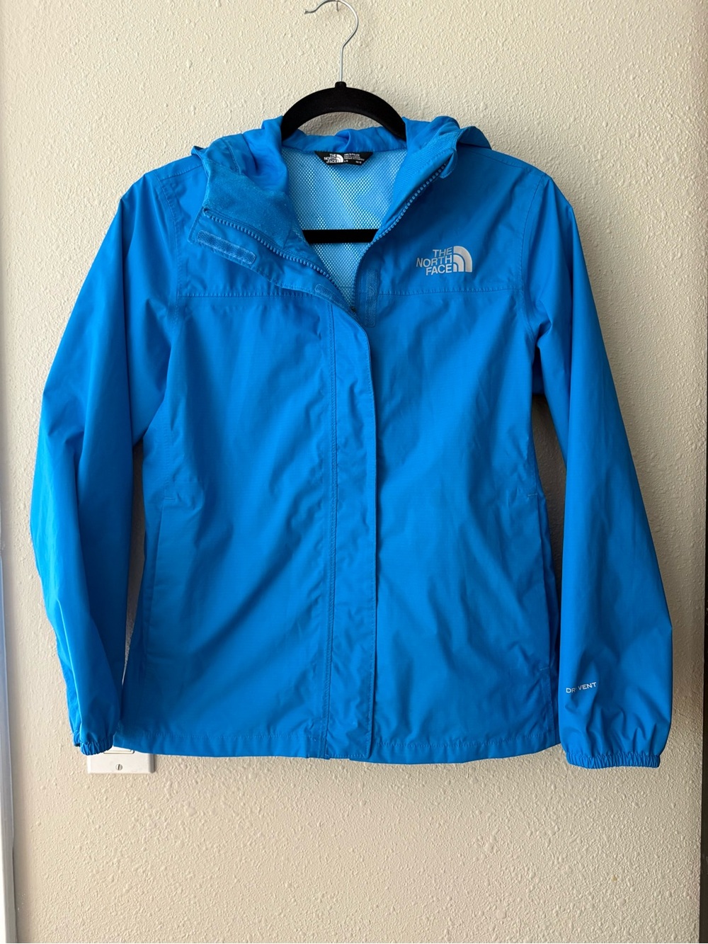 The North Face Girls’ blue Resolve Rain Jacket windbreaker – L (14/16)